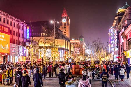BEIJING China 23.02.2019 People crowd famous Wangfujing snack street during night in Pekingのeditorial素材