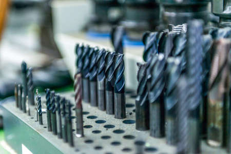 Flat lay various Size of cutting tools used carbide Endmills for machining center in metal work