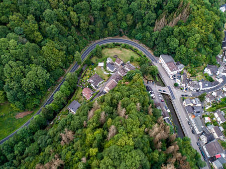 Winding road serpentine from a high pass in the rhine village Isenburg near Bendorf Sayn Germany...