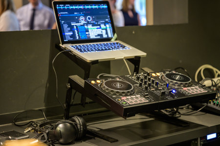 Professional DJ Equipment sound and audio mixer control panel with buttons and sliders