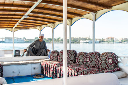Luxor, Egypt 18.05.2018 Motor boats for crossing the Nile river to the other side, Ornate river transportのeditorial素材
