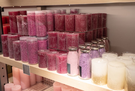 Multicolor store front or supermarket with decorative aromatic candles. Shopping, sale, consumerism and people conceptの写真素材