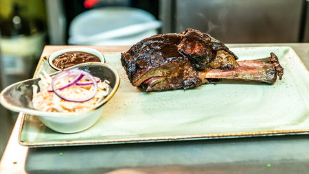A top sirloin steak flame broiled on a barbecue shallow depth of field.の写真素材