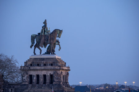 Night shot morning mist Koblenz City Germany historic monument German Corner where rivers rhine and mosele flow togetherの写真素材