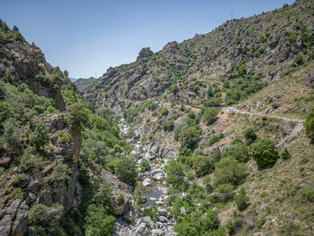 Camping Caravan driving through Canyon de la Ruda road Corsica down the pass monte Cinoの写真素材