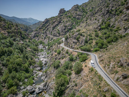 Camping Caravan driving through Canyon de la Ruda road Corsica down the pass monte Cinoの写真素材
