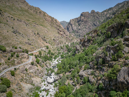 Camping Caravan driving through Canyon de la Ruda road Corsica down the pass monte Cinoの写真素材
