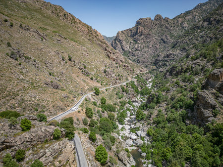 Camping Caravan driving through Canyon de la Ruda road Corsica down the pass monte Cinoの写真素材
