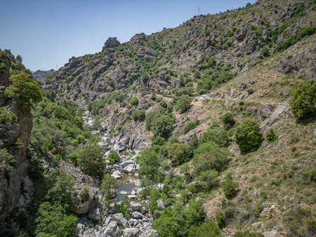 Camping Caravan driving through Canyon de la Ruda road Corsica down the pass monte Cinoの写真素材