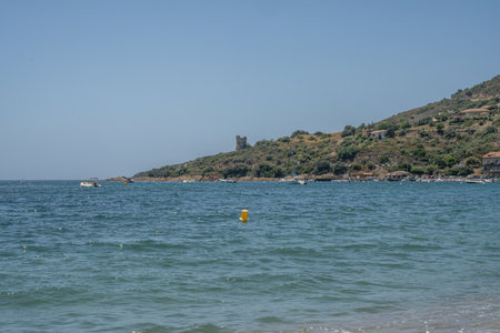 Spectacular view at Sagone Corsica France beautiful sand Beach boats mountain village Tourism and...