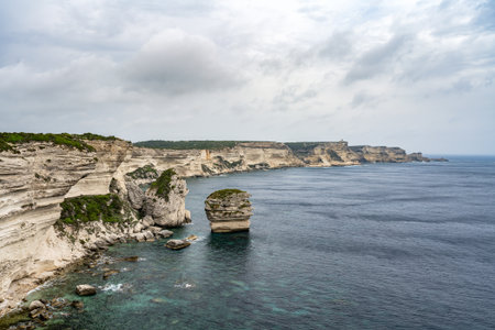 Aerial view marina cape Bonifacio south Corsica France citadel on rocky promontory on wild white limestone cliffsの写真素材