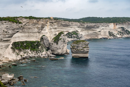 Aerial view of a rocky promontory on wild white limestone cliffsの写真素材