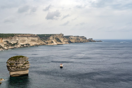 Aerial view marina cape Bonifacio south Corsica France citadel on rocky promontory on wild white limestone cliffsの写真素材