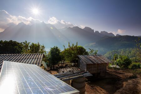 Mountains behind Solar panelsの写真素材
