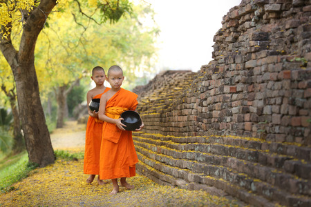 Chiangmai City WallThailand  April 22 2014:Buddhist Monk walking for receive foodのeditorial素材