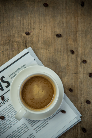 Coffee cup and Newspaper for businessの写真素材