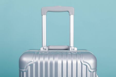 Travel Baggage isolated on blue background with copy space, Travel concept backgroundの写真素材