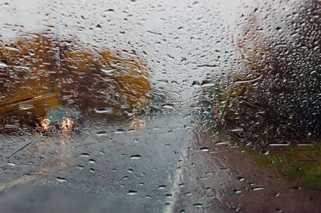 Rain road cloudy cars autumn.