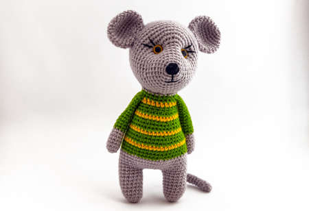 Mouse Amigurumi posing for a photographer standing on a white background.の写真素材