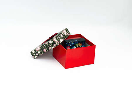 Gift boxes glued with colored paper with bows.