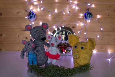 Handmade amigurumi toys celebrate Christmas and give gifts.の写真素材