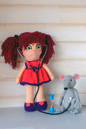 Amigurumi doll is treated for coronavirus.の写真素材
