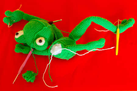 Amigurumi doll crocheted elements. Crochet hooks.の写真素材