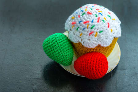 Handmade crocheted Easter eggs and Easter cake