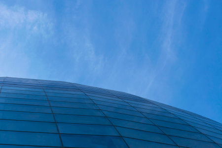 High-rise building leaves perspective in the skyの写真素材