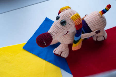 Handmade amigurumi dolls dogs background multicolored