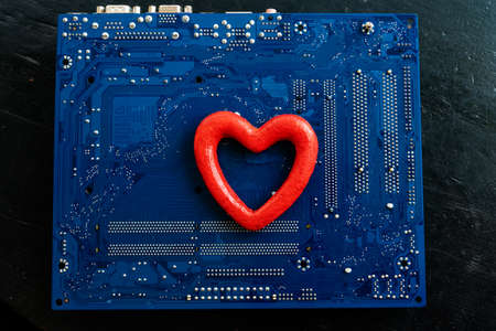 Red heart on a blue background. Happy Valentine's Day greeting card.の写真素材