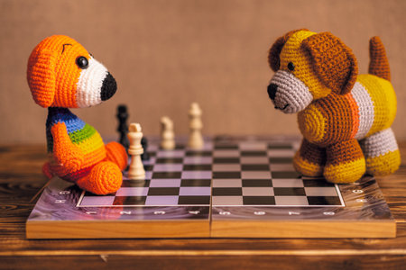 Amigurumi handmade dolls two dogs play chess