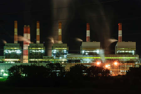 Coal power plant with steam pouring out of the stack, Mae Moh Power Plant, Lampang, Thailand 