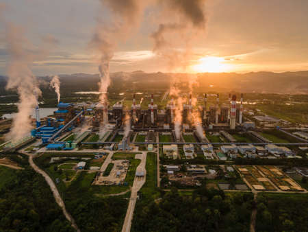Coal power plant with steam pouring out of the stack, Mae Moh Power Plant, Lampang, Thailand