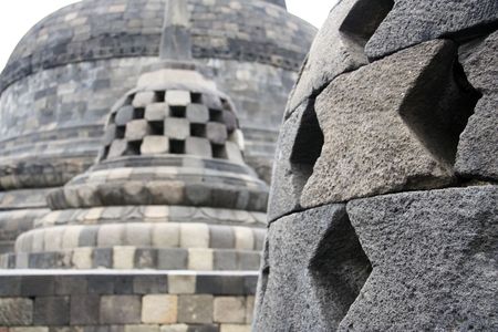 detail of stupas atop borobudur ruins near yogyakarta in java indonesiaの写真素材