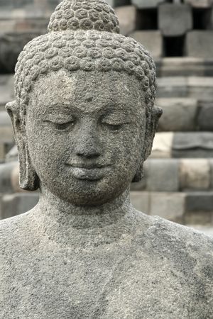 close-up of buddha statue atop borobudur ruins near yogyakarta in java indonesiaの写真素材