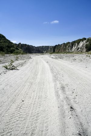 tyre tracks on off road route to mount pinatubo through volcanic crow valley pampanga the philippinesの写真素材