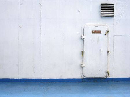 sea door onboard large ferry painted blue and whiteの写真素材