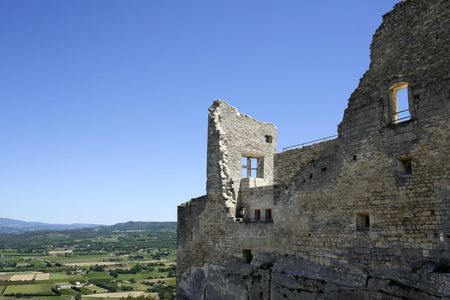 la coste, the ruined castle of the notorious marquis de sade, overlooking the fields of provence in the south of franceの写真素材