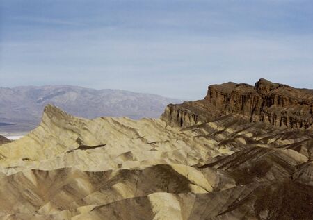 eroded landscape of Zabriskie Point in the Amargosa Range located in Death Valley National Park, California の写真素材