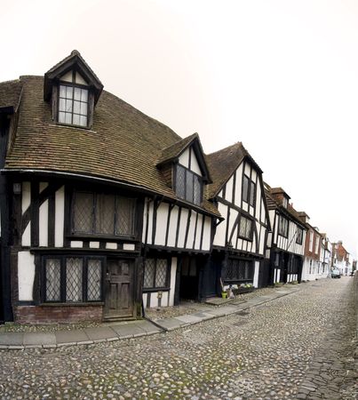 ancient tudor houses line the cobbled street of historic rye in east sussex englandの写真素材