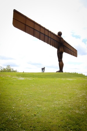 the angel of the north sculpture in gateshead northeast england on a hill overlooking the main a1 roadの写真素材