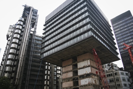City of London, England- June 28 2007 : Office buildingsand cranes surround office block engineering project.のeditorial素材