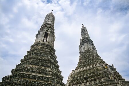 two giant stupas wat arun temple of the dawn prmoinent landmarks in bangkoks old city n thailandの写真素材