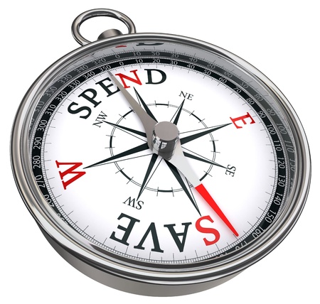 spend versus save concept compass isolated on white backgroundの写真素材