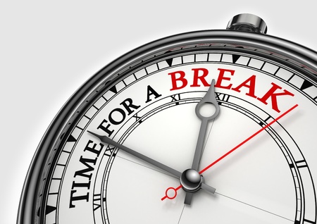 time fora break concept clock closeup on white background with red and black wordsの写真素材