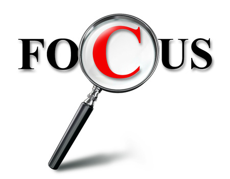 focus word concept with magnifying glass on white background. clipping path includedの写真素材
