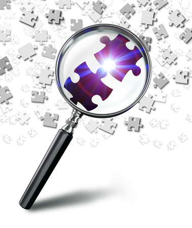 find solution concept with magnifying glass and puzzle on white background. clipping path includedの写真素材