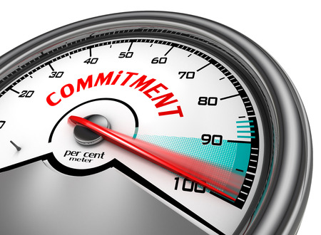 commitment to hundred per cent conceptual meter, isolated on white backgroundの写真素材