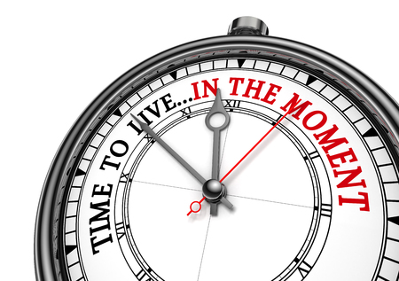 Time to live in the moment motivation clock, isolated on white backgroundの写真素材